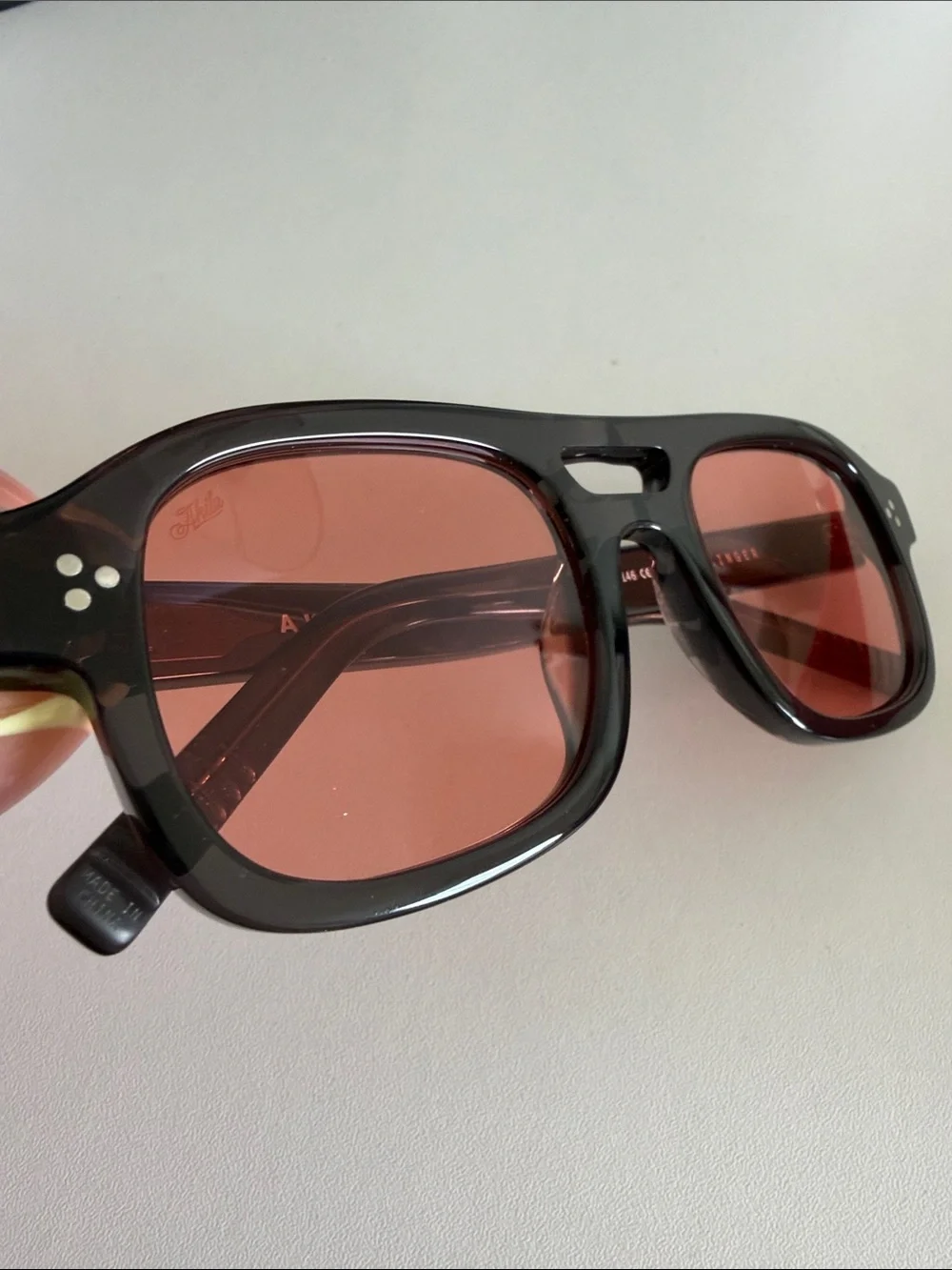 Akila Dillinger Women's Black Frame Sunglasses with Red Lenses